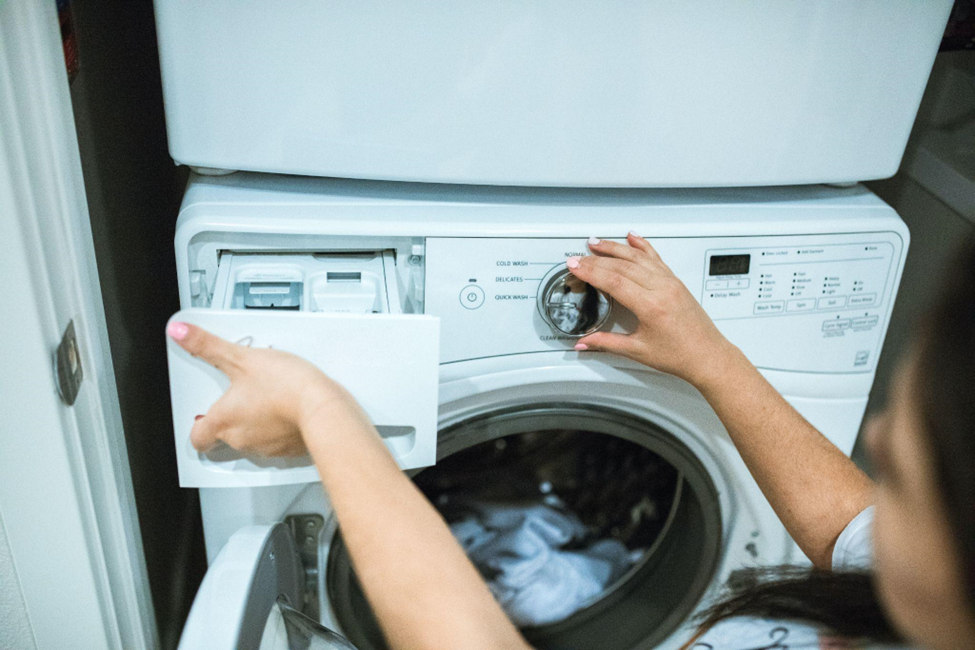 Lowering the temperature on your washing machine can help save on energy costs and prolong the life of your clothing.
